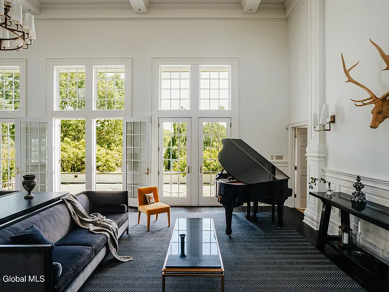 Valatie NY Equestrian Estate, living room with vaulted ceilings and black-and-white motif