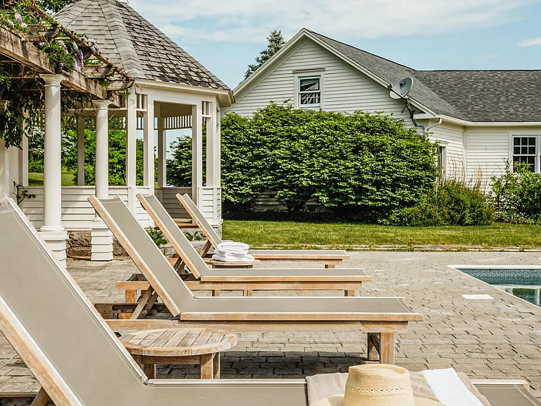 Valatie NY Equestrian Estate, in ground pool with lounge chairs on a large deck