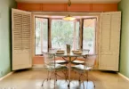 1950s suburban family life home, phoenix arizona 1957 ranch style home with perfectly preserved pink and teal kitchen and breakfast nook