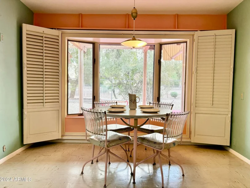 1950s suburban family life home, phoenix arizona 1957 ranch style home with perfectly preserved pink and teal kitchen and breakfast nook