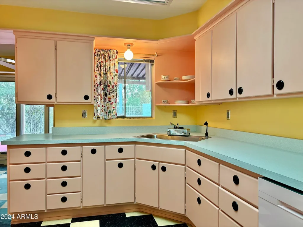 1950s suburban family life home, phoenix arizona 1957 ranch style home with perfectly preserved pink and teal kitchen