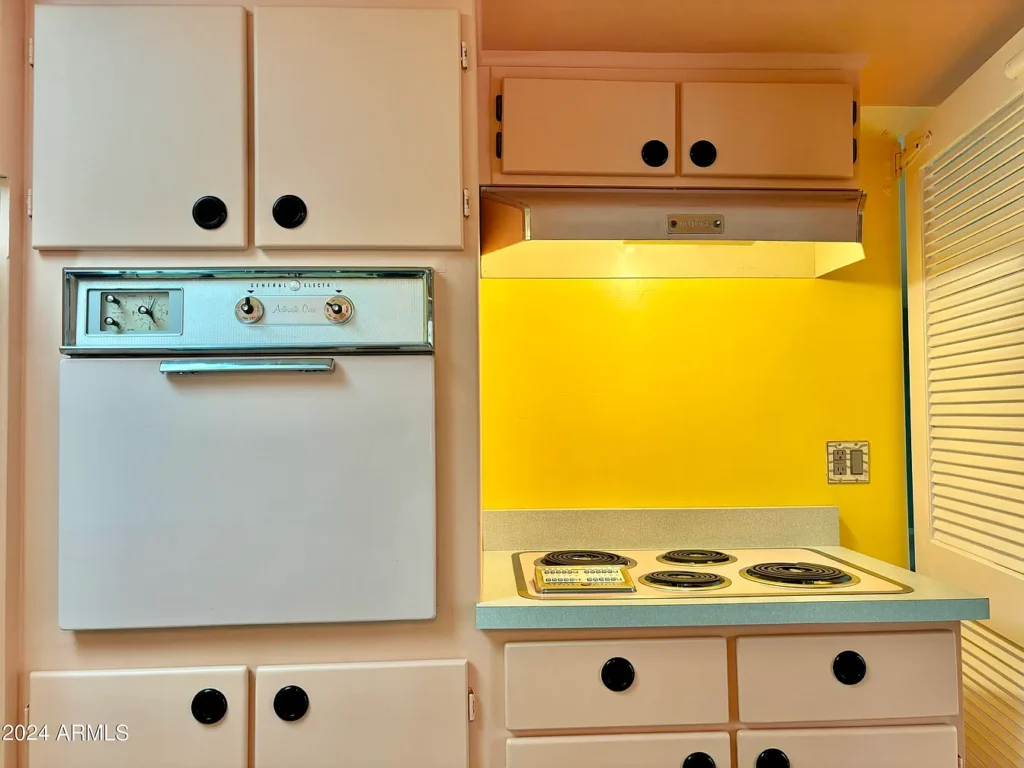 1950s suburban family life home, phoenix arizona 1957 ranch style home with perfectly preserved pink and teal kitchen