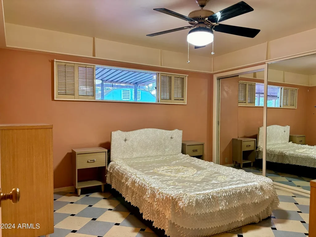 1950s suburban family life home, phoenix arizona 1957 ranch style home with high master bedroom windows and lace coverlets