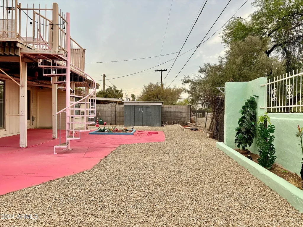 1950s suburban family life home, phoenix arizona 1957 ranch style home with original details and spiral exterior staircase