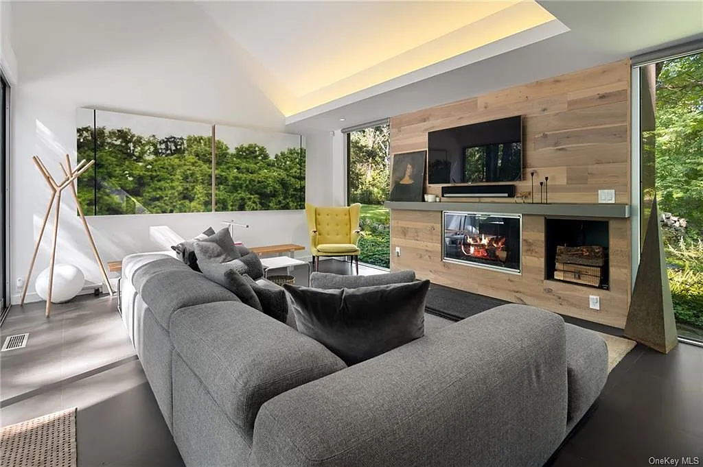 modern chappaqua, ny house, modern interior design den and tv room