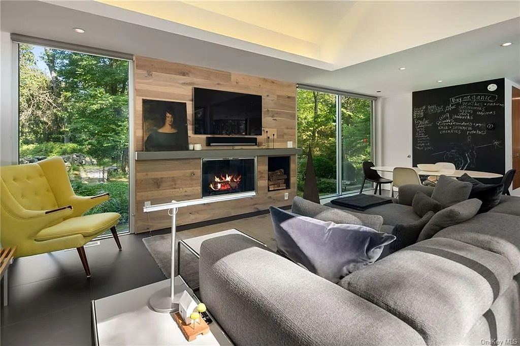 modern chappaqua, ny house, modern interior design den and tv room