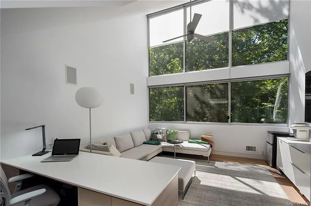 modern chappaqua, ny house, modern interior design guest bedroom with vaulted ceilings and skylights