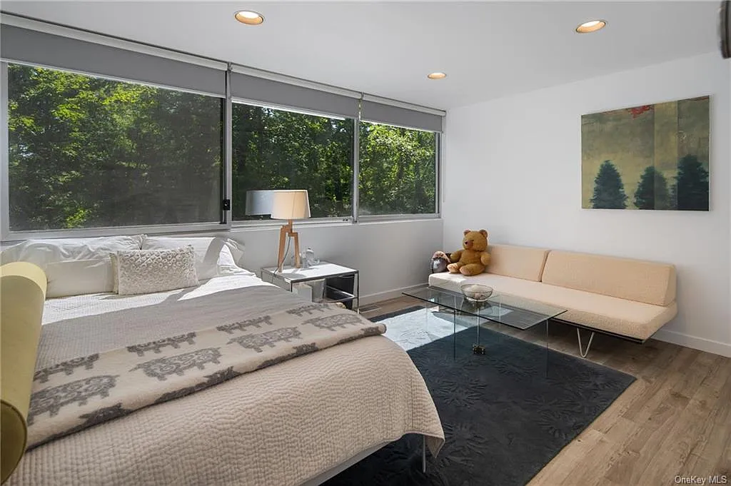 modern chappaqua, ny house, modern interior design bedroom with vaulted ceilings and skylights