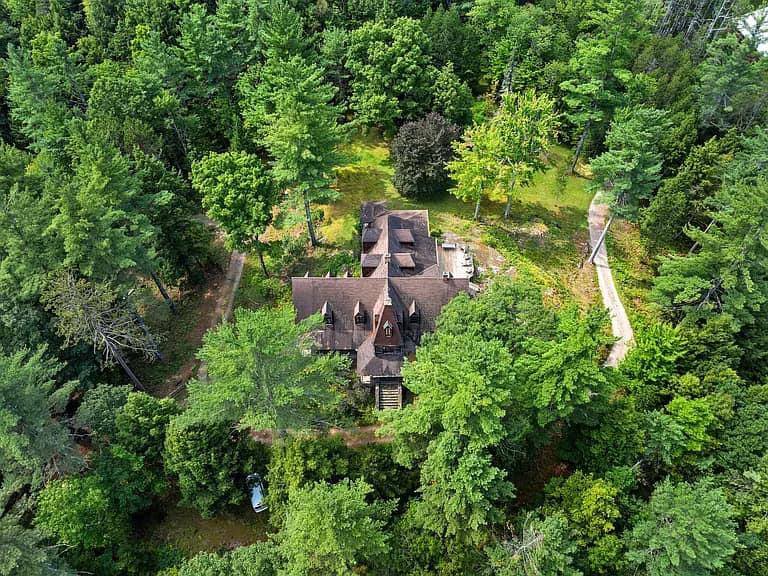 Keene Valley NY house with wood walls and ceilings and log cabin exterior