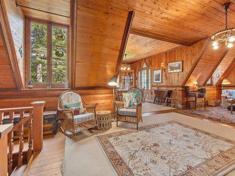 Keene Valley NY house with wood walls and impressive all wood vintage living room with Adirondacks style furniture