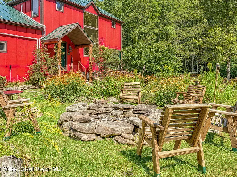 shandaken ny estate set on 35 private acres overlooking the catskill mountains, red painted exterior with green metal roof