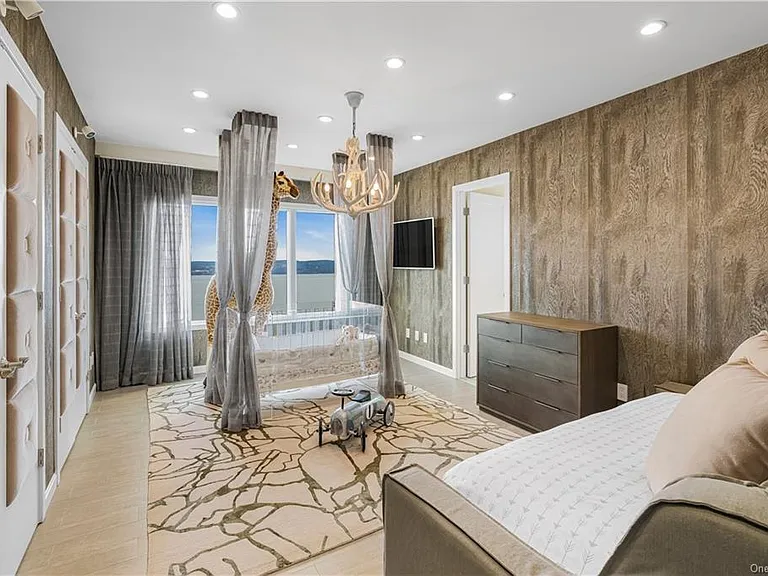 Modern Nyack, NY Palace with windows overlooking the hudson river, sleek modern guest bathroom with scenic Hudson River views with loads of natural light