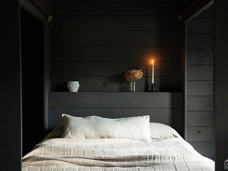 converted dairy barn in accord ny, modern country bedroom with black walls and natural light