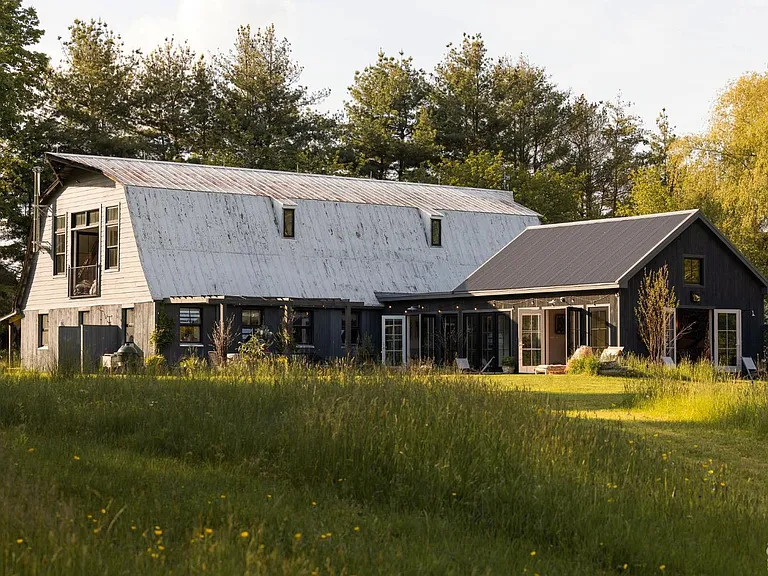 converted dairy barn in accord ny, modern country home exterior with lush greenery