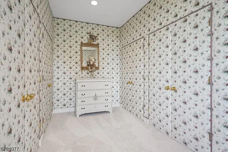 massive NJ castle in chester township listed for $4 million, french country walk in closet with floral wallpaper