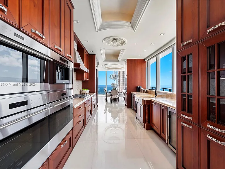 Fort Lauderdale Beach Penthouse, large kitchen overlooking the atlantic ocean with marble farmhouse sink