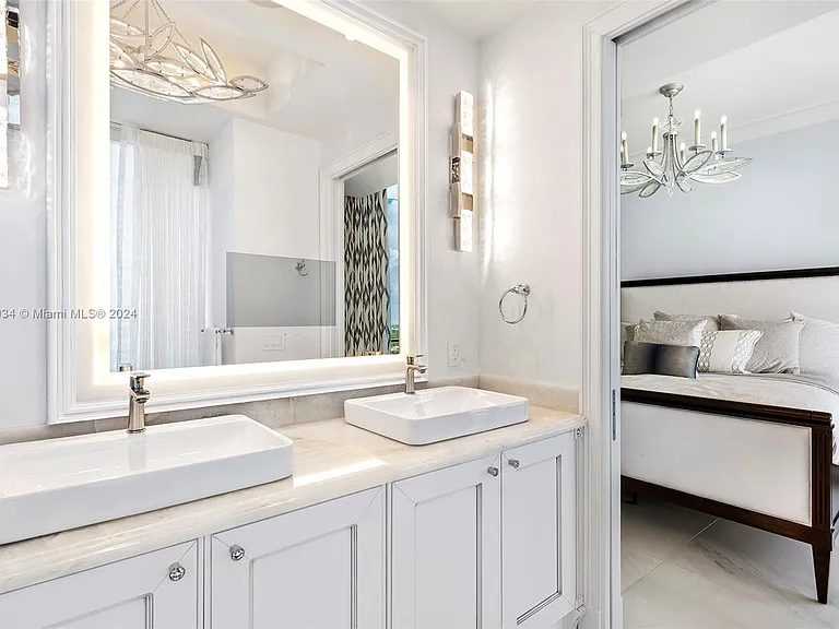 Fort Lauderdale Beach Penthouse, large modern guest bathroom with white design scheme and double sinks