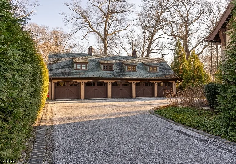 tudor style castle in NJ, five car garage built from stone