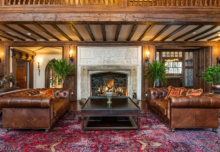 tudor style castle in NJ, large fireplace and tudor fireplace and exposed beams at Glynallyn in Morris Township