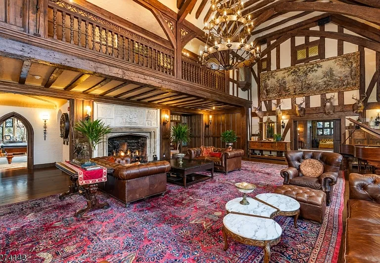 tudor style castle in NJ, large fireplace and tudor fireplace and exposed beams at Glynallyn in Morris Township