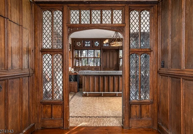 tudor style castle in NJ, antique dark wood lead glass doors