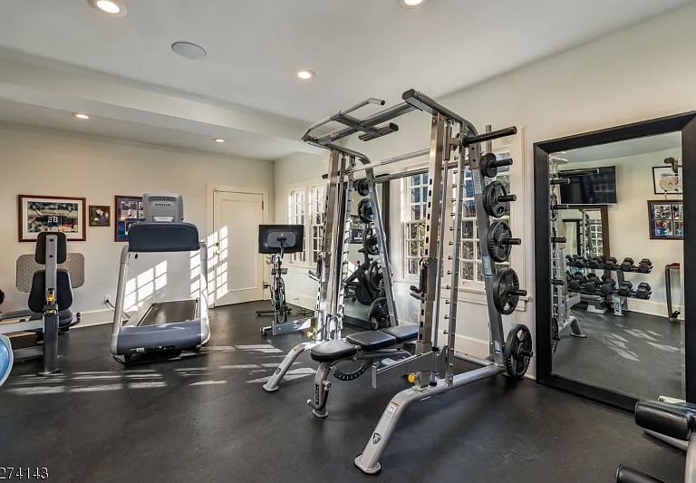 tudor style castle in NJ, modern home gym at glynallyn castle in morris township new jersey