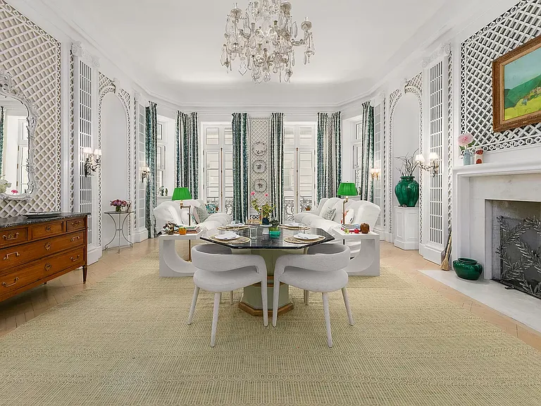 fifth ave nyc mansion listed for $58 million, exterior of 973 fifth avenue with massive rood deck facing central parkfifth ave nyc mansion listed for $58 million, interior of 973 fifth avenue with sun-lit sitting rooms and entertaining spaces