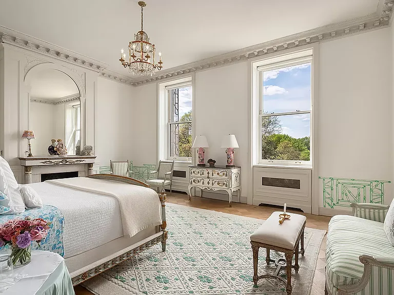 fifth ave nyc mansion listed for $58 million, exterior of 973 fifth avenue with massive rood deck facing central parkfifth ave nyc mansion listed for $58 million, interior of 973 fifth avenue with sun-lit bedrooms