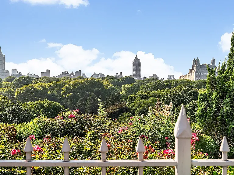 fifth ave nyc mansion listed for $58 million, exterior of 973 fifth avenue with massive rood deck facing central park