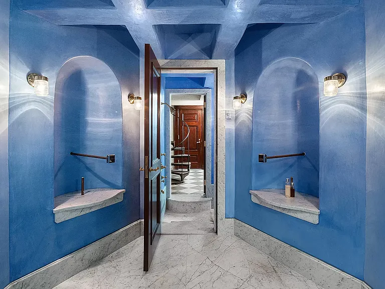 fifth ave nyc mansion listed for $58 million, interior of 973 fifth avenue with massive cerulean blue foyer