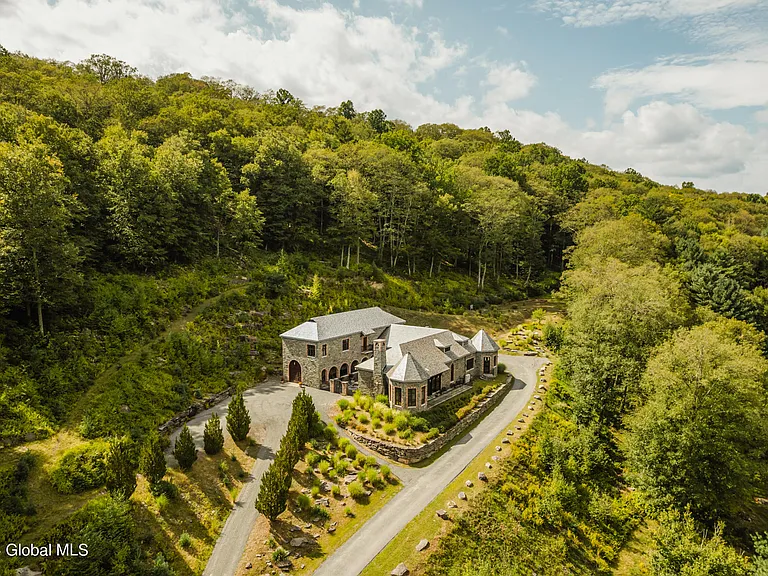 massive catskills ny castle for sale in sullivan county, stone and brick exterior overlooking the catskill mountain range and hudson valley