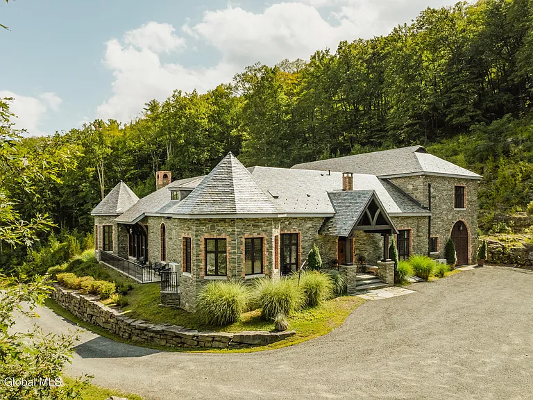 massive catskills ny castle for sale in sullivan county, stone and brick exterior overlooking the catskill mountain range and hudson valley