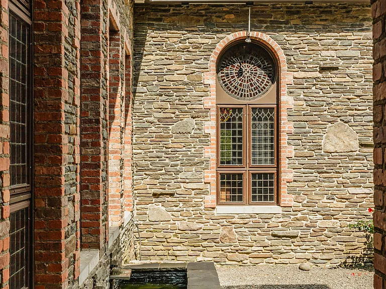 massive catskills ny castle for sale in sullivan county, stone and brick exterior archways