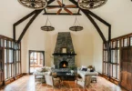 massive catskills ny castle for sale in sullivan county, arched tudor style living room with vaulted ceilings