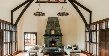 massive catskills ny castle for sale in sullivan county, arched tudor style living room with vaulted ceilings