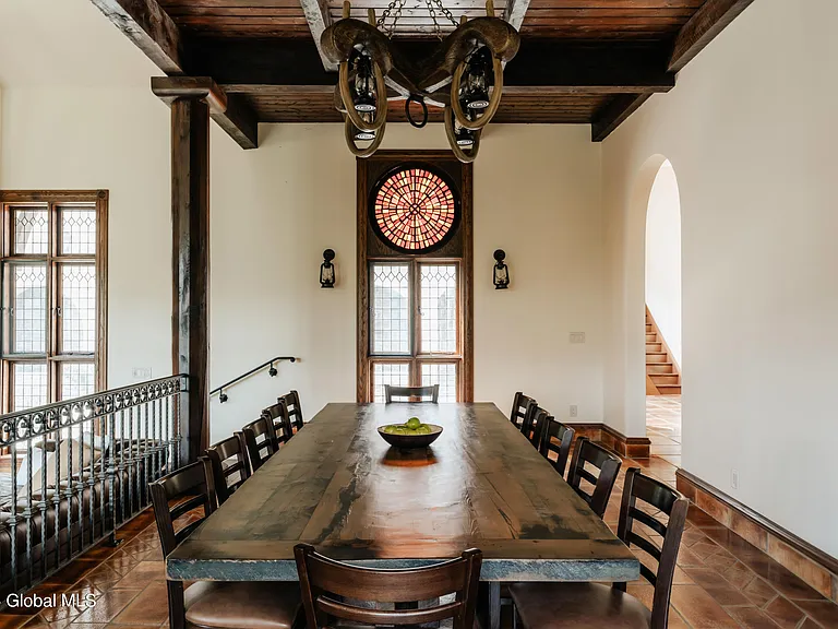 massive catskills ny castle for sale in sullivan county, tudor style kitchen and dining spaces