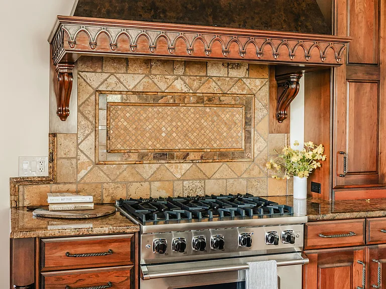 massive catskills ny castle for sale in sullivan county, tudor style kitchen massive gas stove and tuscan style tile backsplash