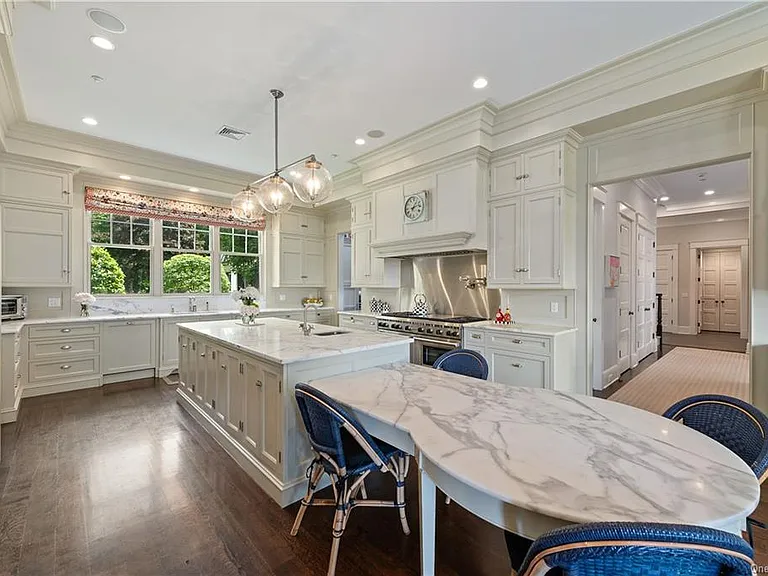 Westchester Mansion, interior of Happy Hill Farms in Bedford Corners New York with massive white marble eat in kitchen