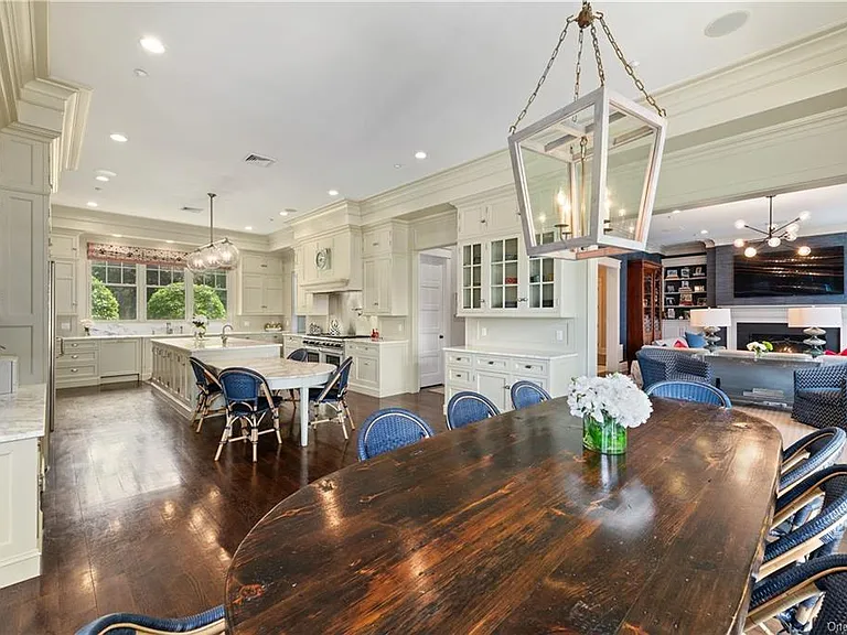 Westchester Mansion, interior of Happy Hill Farms in Bedford Corners New York with massive white marble eat in kitchen and extended island