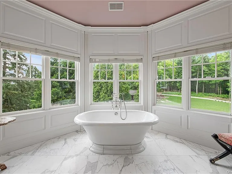 Westchester Mansion, interior of Happy Hill Farms in Bedford Corners New York with massive master bathroom with soaking tub and pink tray ceiling