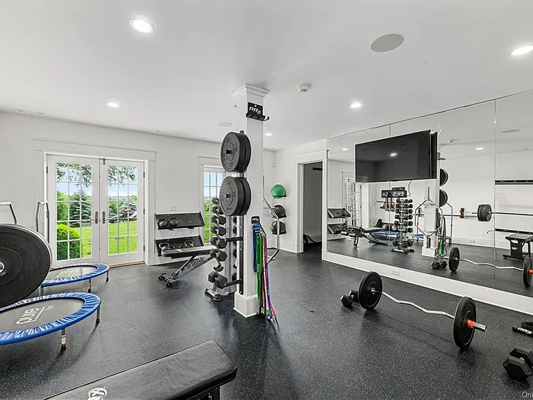 Westchester Mansion, interior of Happy Hill Farms in Bedford Corners New York with a massive indoor private home gym