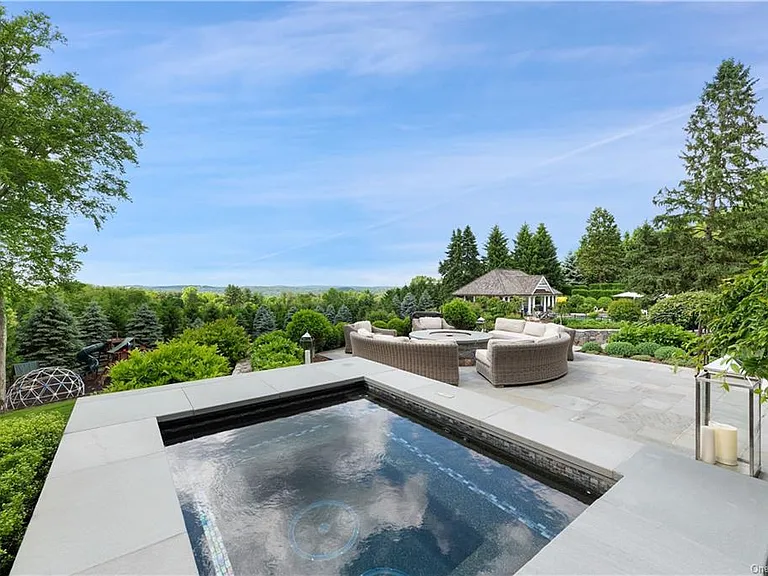 Westchester Mansion, exterior of Happy Hill Farms in Bedford Corners New York with outdoor water features overlooking the hudson valley