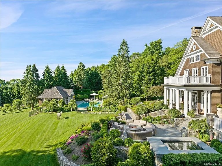 Westchester Mansion, exterior of Happy Hill Farms in Bedford Corners New York with impressive in-ground pool