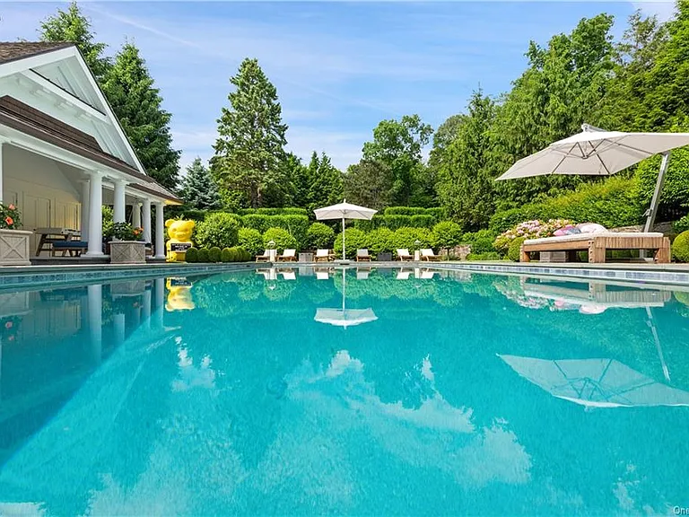 Westchester Mansion, exterior of Happy Hill Farms in Bedford Corners New York with impressive in-ground pool