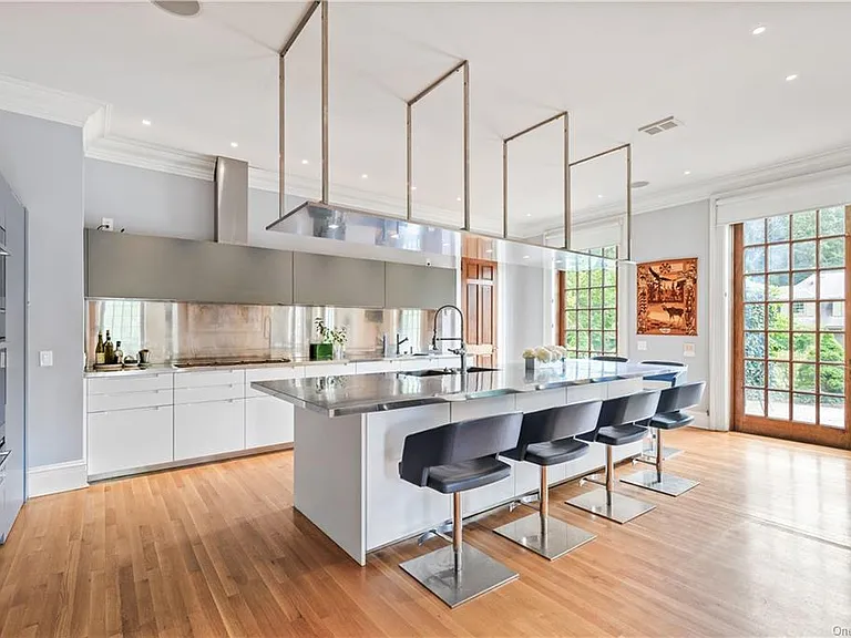 eclectic castle in new york, interior of the Salutation Castle replica with modern industrial kitchen