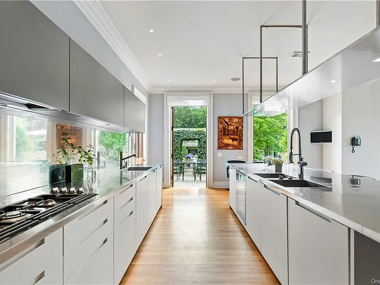 eclectic castle in new york, interior of the Salutation Castle replica with modern industrial kitchen