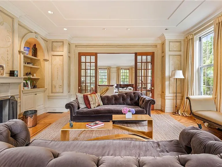 eclectic castle in new york, interior of the Salutation Castle replica with antique victorian era living room