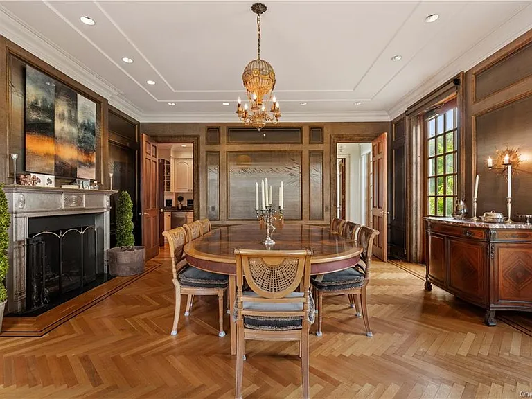 eclectic castle in new york, interior of the Salutation Castle replica with antique victorian era dining hall