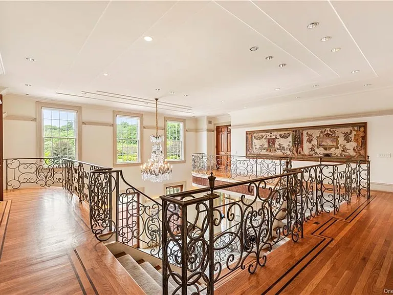 eclectic castle in new york, interior of the Salutation Castle replica with wrought iron railings throughout