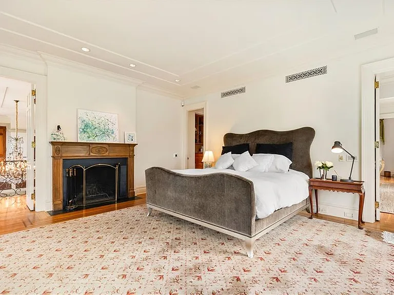 eclectic castle in new york, interior of the Salutation Castle replica with english countryside bedrooms and floral wallpaper